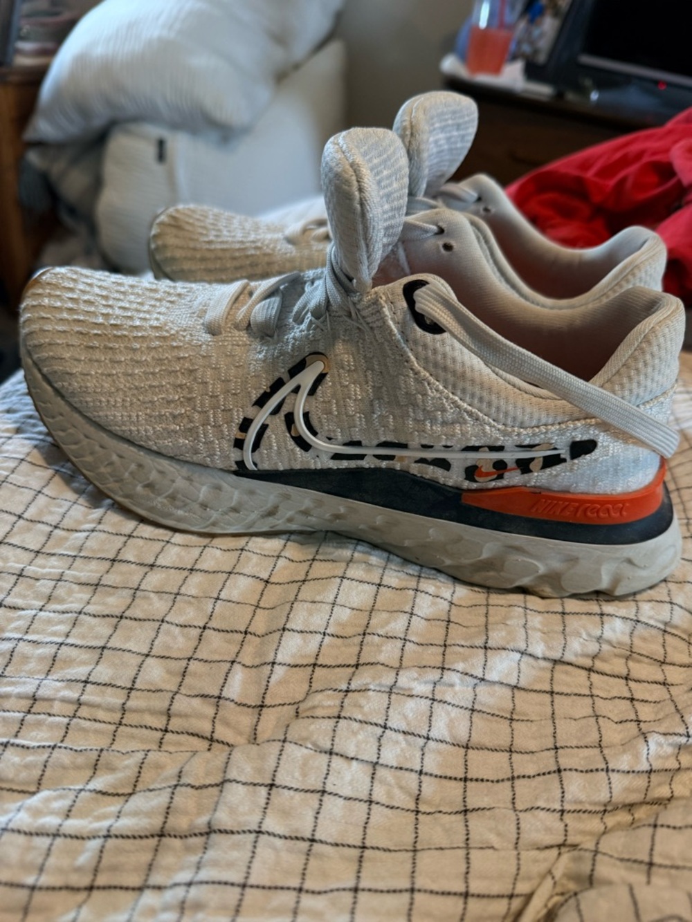 Women’s Nike Neutral White Athletic Sneakers with Orange Accent